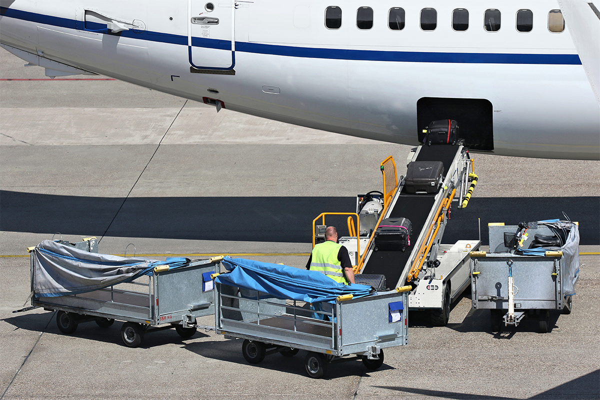Aircraft Cleaning Services Aviation HHS Support Services Aviation Website 0001 Airline Services Provide A Safe And Reliable Experience Loose Luggage Being Loaded 
